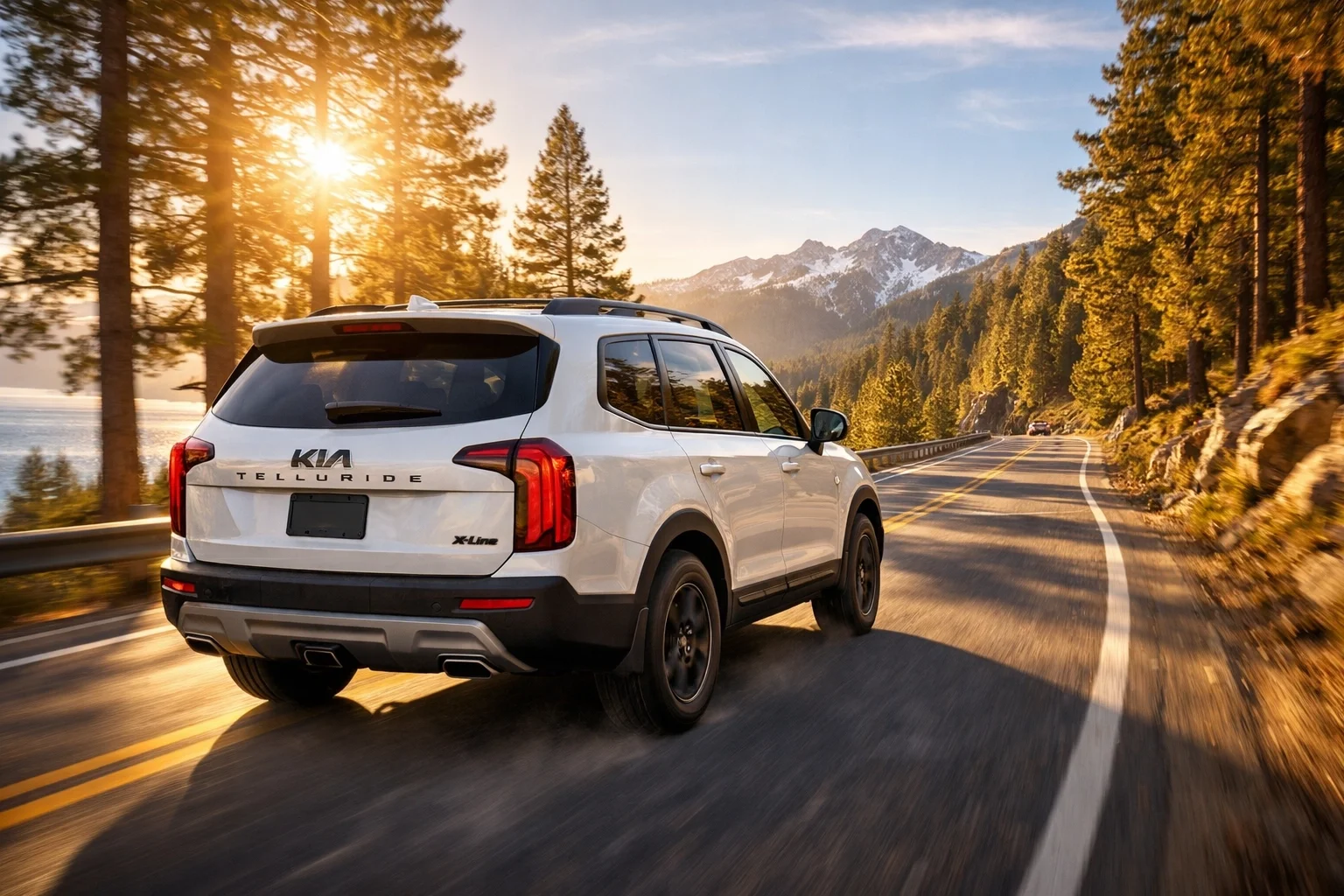 A white Kia Telluride driving near Lake Tahoe, backed by top warranties from kia dealerships in sacramento ca.