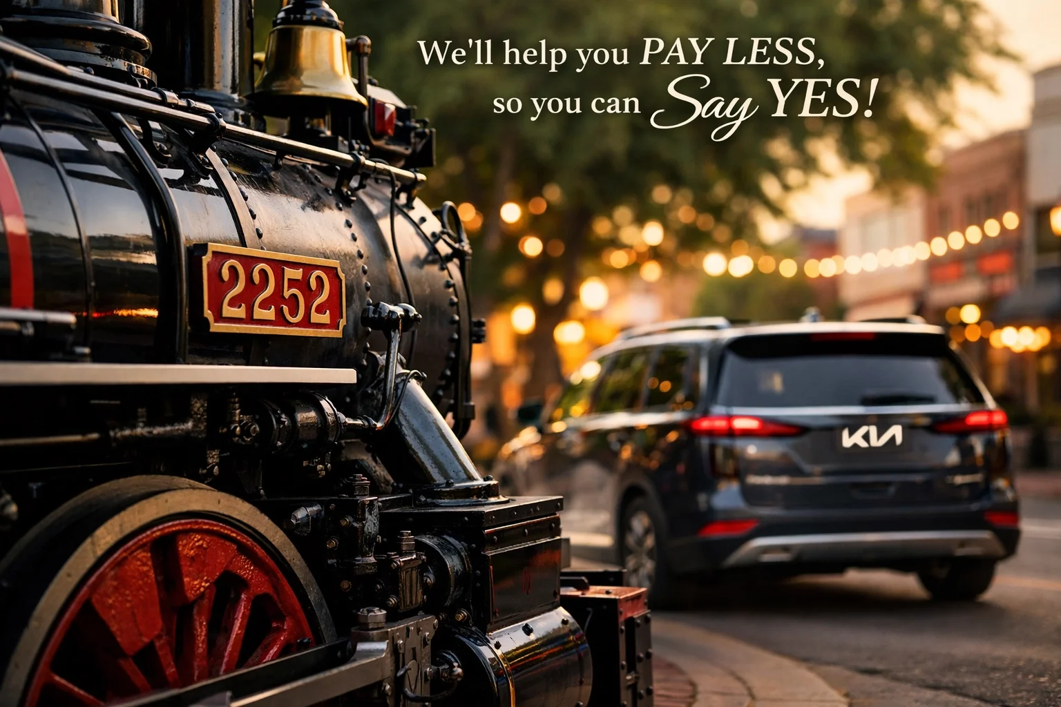 Historic Steam Locomotive 2252 in Downtown Roseville with a modern Kia Carnival parked on Vernon Street.